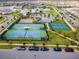 Aerial view of tennis and pickleball courts in community at 14234 Lanikai Beach Dr, Orlando, FL 32827