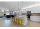 Open-concept kitchen with an island and stainless steel appliances at 14234 Lanikai Beach Dr, Orlando, FL 32827