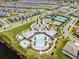 Aerial view showing community amenities and homes at 14234 Lanikai Beach Dr, Orlando, FL 32827