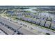 Large community with houses, lake, and green spaces at 14234 Lanikai Beach Dr, Orlando, FL 32827