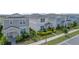 Row of two-story houses with gray siding and landscaping at 14234 Lanikai Beach Dr, Orlando, FL 32827
