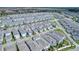 Aerial view of a large community with many houses at 14234 Lanikai Beach Dr, Orlando, FL 32827