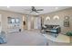 Large bedroom with sitting area and access to bathroom at 14234 Lanikai Beach Dr, Orlando, FL 32827