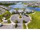 Aerial view of community amenities, including pool and playground at 14234 Lanikai Beach Dr, Orlando, FL 32827