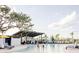 Resort-style pool with cabana and lounge chairs at 3062 Bootlace Way, St Cloud, FL 34771
