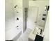 Updated bathroom with a tub, shower, and modern vanity at 118 5Th Jpv St, Winter Haven, FL 33880