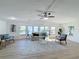Spacious living room featuring hardwood floors and ample natural light at 1622 Tally Ho Dr, Lakeland, FL 33810