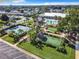 Aerial view of community amenities including pool, tennis, and putting green at 1622 Tally Ho Dr, Lakeland, FL 33810