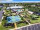 Community pool, clubhouse, and pickleball courts at 1622 Tally Ho Dr, Lakeland, FL 33810