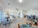 Bright and airy living room with hardwood floors and open concept floorplan at 1622 Tally Ho Dr, Lakeland, FL 33810