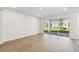 Living room with sliding glass doors leading to the backyard at 16971 Cedar Valley Cir, Clermont, FL 34711