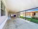 Covered carport with additional storage area at 1622 Tally Ho Dr, Lakeland, FL 33810