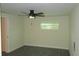 Bright bedroom with ceiling fan and vinyl plank flooring at 3225 Oakland N Rd, Lakeland, FL 33801