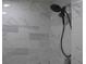 Modern shower with marble-style tile surround at 3225 Oakland N Rd, Lakeland, FL 33801