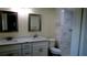 Updated bathroom with double vanity, quartz countertop and walk-in shower at 3225 Oakland N Rd, Lakeland, FL 33801
