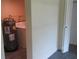 Basement laundry area with stacked washer and dryer at 3225 Oakland N Rd, Lakeland, FL 33801