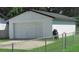 White single car garage with automatic door at 3225 Oakland N Rd, Lakeland, FL 33801