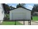 White single car garage with automatic door at 3225 Oakland N Rd, Lakeland, FL 33801