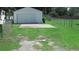Detached garage with large yard and chain link fence at 3225 Oakland N Rd, Lakeland, FL 33801