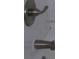 Close up of brushed nickel bathroom fixtures at 3225 Oakland N Rd, Lakeland, FL 33801