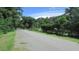 Quiet residential street with mature trees and well-maintained homes at 3225 Oakland N Rd, Lakeland, FL 33801