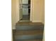 Steps leading down to the basement laundry area at 3225 Oakland N Rd, Lakeland, FL 33801