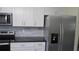 Stainless steel refrigerator in a modern kitchen setting at 3225 Oakland N Rd, Lakeland, FL 33801
