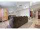 Spacious living area with hardwood floors, comfy couches, and a high ceiling at 105 Hainesport Dr, Lake Alfred, FL 33850