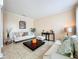 Living room with neutral tones, comfortable sofas, and a stylish coffee table at 924 Timber Isle Dr, Orlando, FL 32828