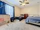 Comfortable bedroom with two beds and ample closet space at 924 Timber Isle Dr, Orlando, FL 32828