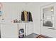Laundry room with washer, dryer, and exterior access at 6505 Raintree Ne Ln, Winter Haven, FL 33881