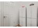 White pantry with ample storage space at 6505 Raintree Ne Ln, Winter Haven, FL 33881