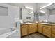 Modern bathroom with double vanity, soaking tub and shower at 3050 Pirates Retreat Ct # 502, Kissimmee, FL 34747