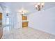 Dining area with wood cabinets and granite countertops at 6556 Red Grange Blvd, Indian Lake Estates, FL 33855