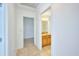 Clean bathroom with granite vanity and tile flooring at 6556 Red Grange Blvd, Indian Lake Estates, FL 33855