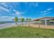 Beachfront gazebo with picnic tables, perfect for relaxation at 6556 Red Grange Blvd, Indian Lake Estates, FL 33855