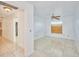 Spacious bedroom with tile flooring and ceiling fan at 6556 Red Grange Blvd, Indian Lake Estates, FL 33855
