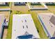 Aerial view of a house showcasing a well-maintained roof and surrounding landscape at 6048 Forest Ridge Ln, Winter Haven, FL 33881