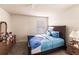 Bedroom with a king-size bed, dresser, and window coverings at 6048 Forest Ridge Ln, Winter Haven, FL 33881