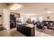Open kitchen with island, stainless steel appliances, and view of living room at 6048 Forest Ridge Ln, Winter Haven, FL 33881