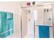 Clean bathroom with shower/tub combo, built-in shelves, and updated vanity at 6048 Forest Ridge Ln, Winter Haven, FL 33881