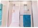Clean bathroom with shower/tub combo, built-in shelves, and updated vanity at 6048 Forest Ridge Ln, Winter Haven, FL 33881
