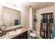 Bathroom with bathtub, shower, and updated vanity at 6048 Forest Ridge Ln, Winter Haven, FL 33881