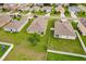 Aerial view of houses with spacious backyards and community at 6048 Forest Ridge Ln, Winter Haven, FL 33881