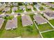 Aerial view of homes with lush green backyards at 6048 Forest Ridge Ln, Winter Haven, FL 33881