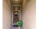 Bright entryway with tiled floors and a view into the living room at 6048 Forest Ridge Ln, Winter Haven, FL 33881