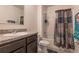 Bathroom with bathtub, shower, and updated vanity at 6048 Forest Ridge Ln, Winter Haven, FL 33881