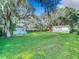 Large backyard with detached garage and shed at 1722 Montee Ln, Lakeland, FL 33811