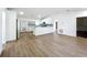 Modern kitchen featuring white cabinets, quartz countertops, and stainless steel appliances at 1722 Montee Ln, Lakeland, FL 33811