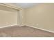 Spacious bedroom with neutral walls and brown carpet at 5333 River Rock Rd, Lakeland, FL 33809